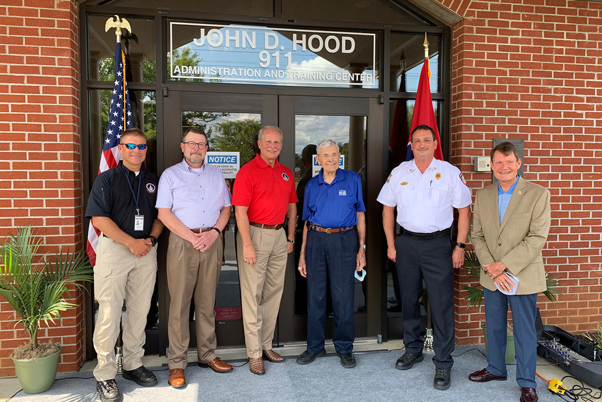 Pictured, from left, are Rutherford County Emergency Management Agency/Public Safety Director Chris Clark, Rutherford County Emergency Communications District Director Steve Smith, Rutherford County Mayor Bill Ketron, John D. Hood, Murfreesboro Fire Rescue Chief Mark Foulks, and retired Murfreesboro Police Department Chief Glenn Chrisman. The Rutherford County 911 center was named Friday in honor of Hood, the 911 Board’s longest-serving member and treasurer and current director of government relations at MTSU. (Photo by Ashley McDonald/Rutherford County Mayor’s Office)