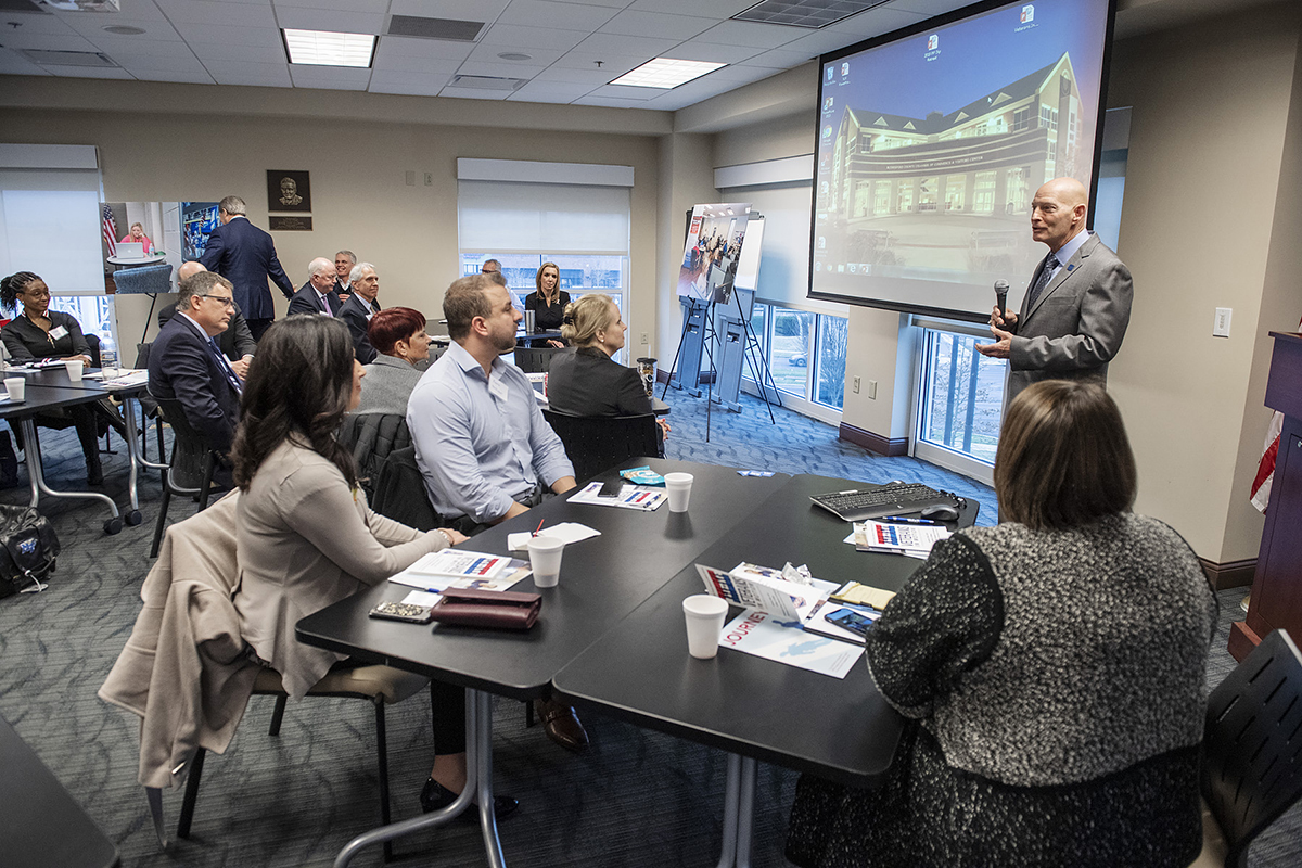 Keith M. Huber addresses "Veterans in Motion" audience.