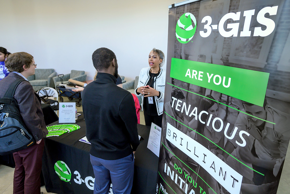 In this August 2019 file photo, MTSU students talk to a recruiter from the telecommunciations company 3-GIS at the IT Connect Career Fair in the Miller Education Center Atrium on Bell Street. (MTSU file photo by Andy Heidt)