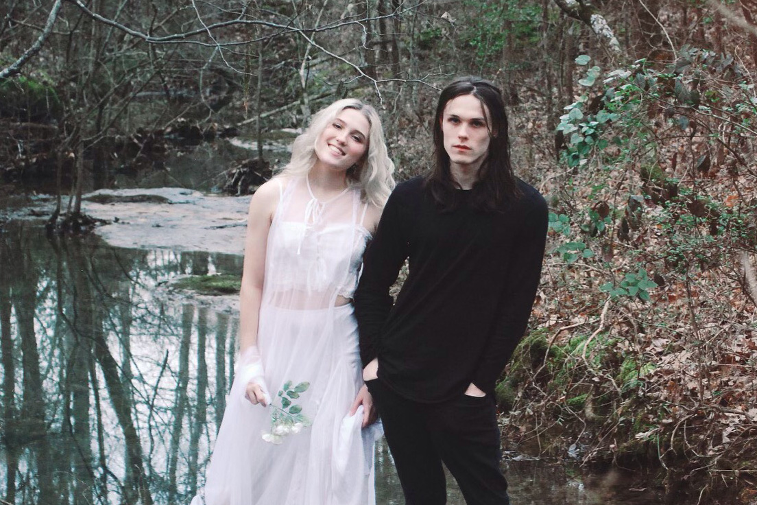 Sunshine Scott, a Music Industry major, and her brother, Sterling Scott, in front of a lake