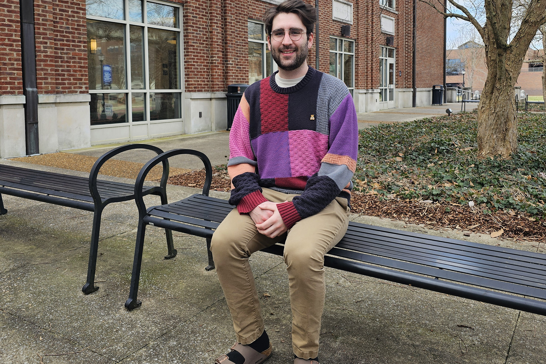 Middle Tennessee State University Buchanan Transfer Fellow Jake Salter sits outside the Paul W. Martin Sr. Honors Building on the MTSU campus in Murfreesboro, Tenn. He was awarded the Fulbright Canada-Mitacs Globalink Research Internship, which will take place this summer in Quebec. (MTSU photo by Robin E. Lee)