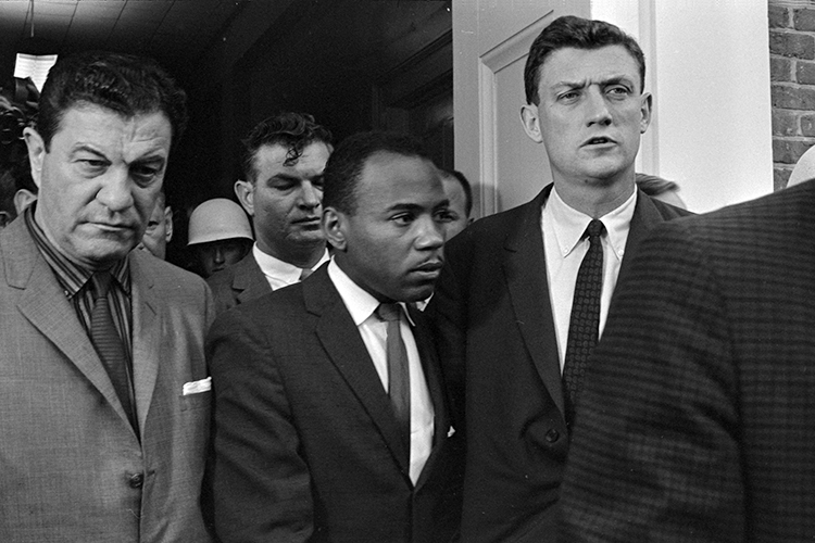 James Meredith, center, walks out of a building on the campus of the University of Mississippi, accompanied by U.S. marshals, in October 1962 after enrolling in the whites-only institution in Oxford to take classes and exercise his rights as a U.S. citizen. Meredith will serve as the keynote speaker for MTSU’s 2019 Unity Luncheon, set Thursday, Feb. 14, in the Student Union Ballroom. (File photo by Marion S. Trikosko/Library of Congress)