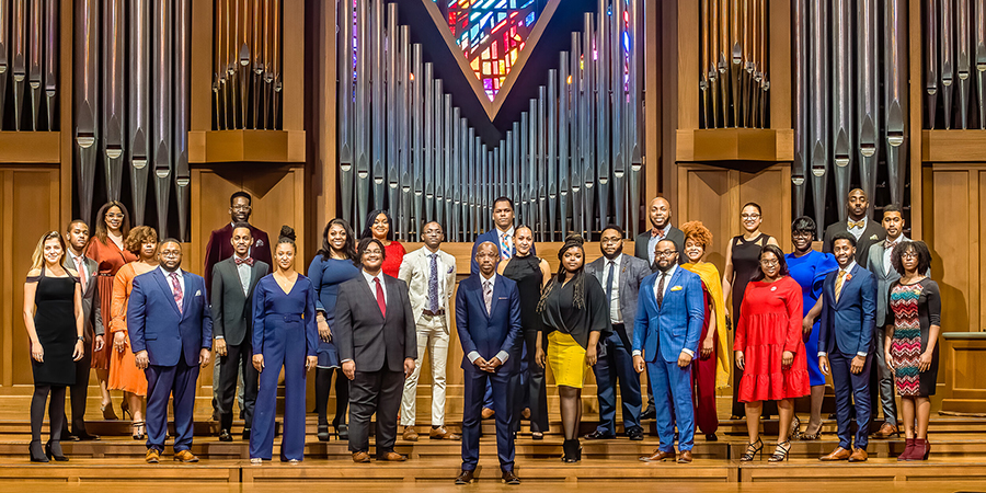 Award-winning choral director Jason Max Ferdinand, center, is surrounded by members of the choral group that shares his name in this publicity photo. The Jason Max Ferdinand Singers are set for a free public concert at MTSU, set Saturday, Feb. 26, at 4 p.m. in Hinton Hall inside the university's Wright Music Building at 1439 Faulkinberry Drive. (image provided)