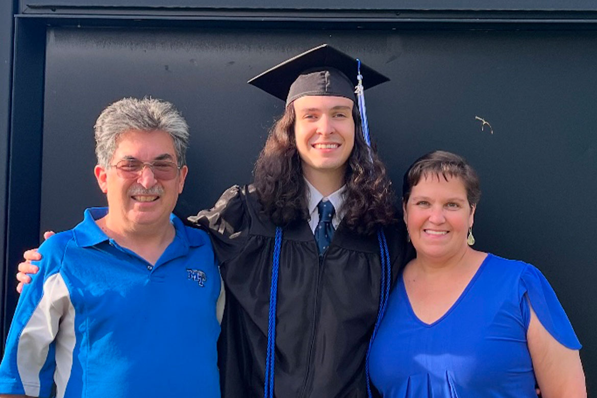 Joseph Jernigan, center, is pictured here with his parents — father Doug, left, and mom, Joyce Jernigan right — on his graduation day from Middle Tennessee State University on May 9, 2025, at Murphy Center in Murfreesboro, Tenn. Joseph followed in his father’s footsteps and attended his alma mater while taking advantage of the Academic Common Market, graduating from the College of Media and Entertainment with a degree in media management. (Photo submitted)