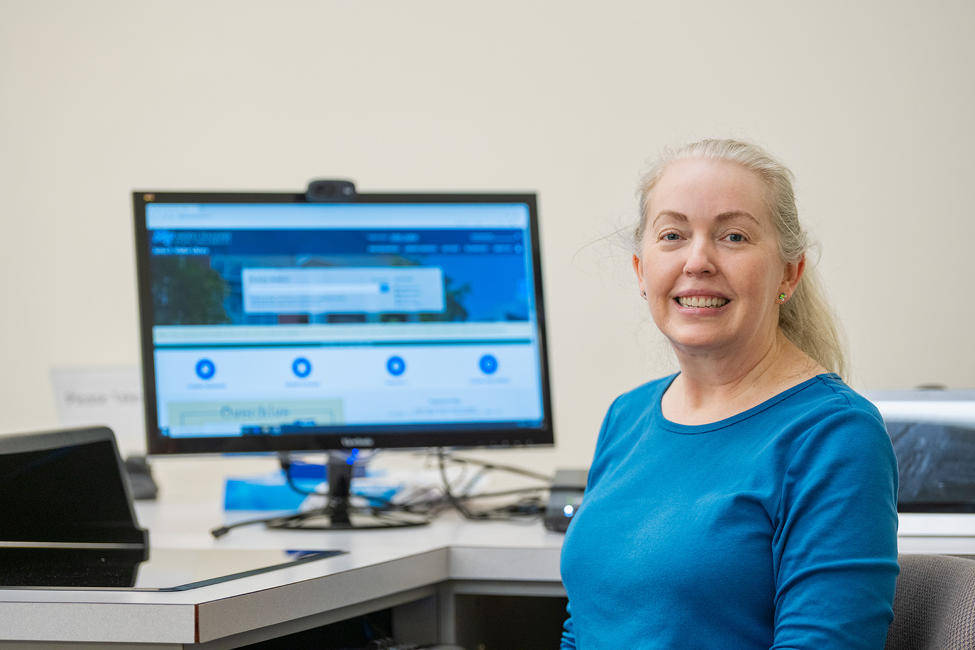 Karen Dearing, Reference & Instruction Librarian, James E. Walker Library, in and around the Library. (Photo: Andy Heidt)