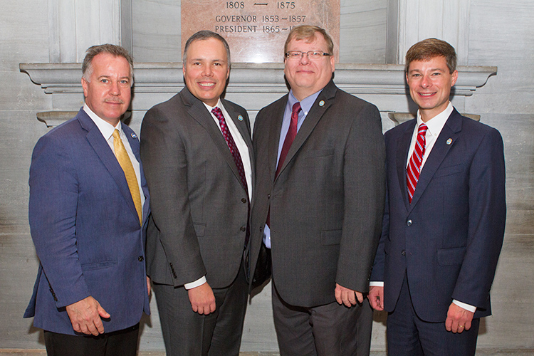 Four members of the Rutherford County state legislative delegation are shown Tuesday following the swearing in ceremony at the state Capitol in Nashville, Tenn., for the 111th Tennessee General Assembly. Pictured, from left, are returning state Reps. Mike Sparks, an MTSU alumnus, Bryan Terry and Tim Rudd, and new state Sen. Charlie Baum, an MTSU economics and finance professor. (MTSU photo by James Cessna)