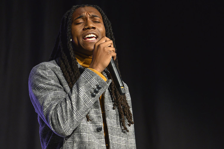 Former MTSU student Marquese Parram sings “A Change Is Gonna Come” Monday, Jan. 20, at the 2020 Martin Luther King Jr. Day Candlelight Vigil hosted by Middle Tennessee State University inside the Student Union Ballroom. (MTSU photo by Cat Curtis Murphy)