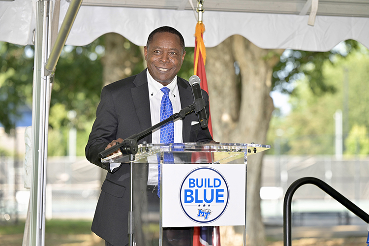 MTSU President Sidney A. McPhee is all smiles Thursday, Sept. 15, at the groundbreaking ceremony for the Blue Raiders' new outdoor tennis complex to be built near the corner of Middle Tennessee Boulevard and Greenland Drive where the current outdoor courts are located. (MTSU photo by Andy Heidt)