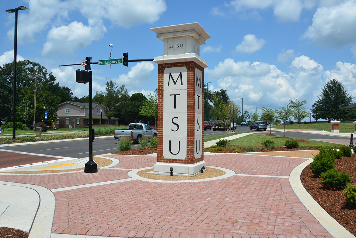 Traffic flows Friday, Aug. 2, along Middle Tennessee Boulevard at Faulkinberry Drive, which now features upgraded crosswalks and signals as well as new landscaping and decorative entrances. MTSU and the city of Murfreesboro hosted a ribbon-cutting Friday to celebrate the completion of the $18.2 million renovation project to Middle Tennessee Boulevard. (MTSU photo by Jimmy Hart)