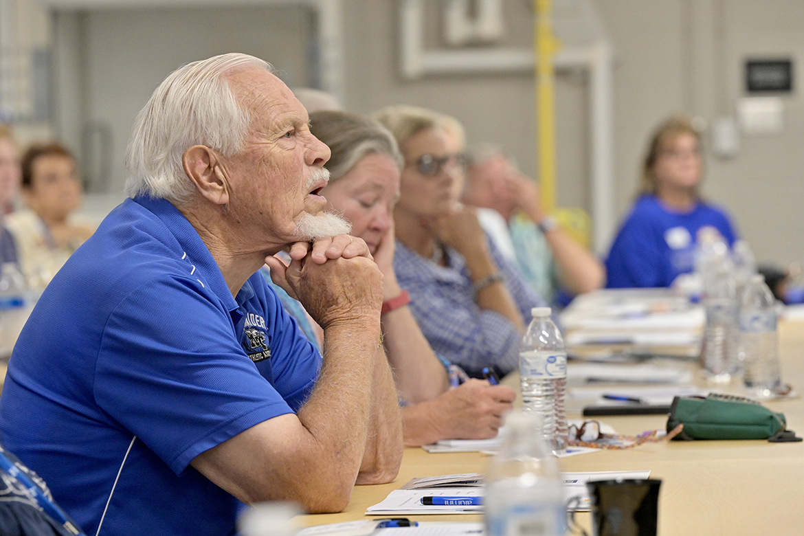 MTSU Alumni Summer College attendee Don Midgett listens to a fermentation science demonstration about yogurt. Nearly 70 alumni and guests participated in the recent two-day event that included talks by MTSU faculty in the Davis Science Building and field trips to Manchester and Woodbury, Tenn. Midgett is married to alumna Carolyn Midgett (Class of 1964). His father, Elwin W. “Wink” Midgett, arrived at MTSU in 1939 to start the business program at Middle Tennessee State Teachers College. The Midgett Building, which is connected to Kirksey Old Main, is named for E.W. Midgett. (MTSU photo by Andy Heidt)
