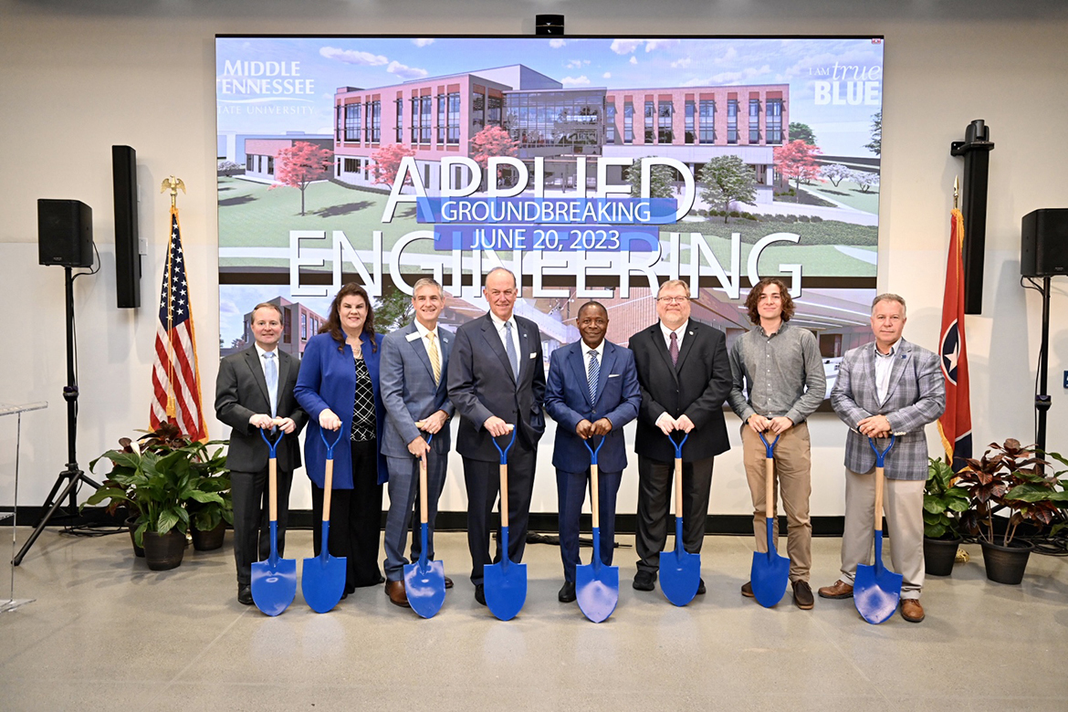 Tennessee lawmakers joined Middle Tennessee State University officials Tuesday, June 20, for the Applied Engineering Building groundbreaking ceremony, held in a large School of Concrete and Construction Management Building classroom because of rain. Attendees included, from left, Rep. Robert Stevens, Sen. Dawn White, College of Basic and Applied Sciences Dean Greg Van Patten, alumnus and Board of Trustees Chair Steve Smith, President Sidney A. McPhee, Rep. Tim Rudd, MTSU rising senior electromechanical engineering student Gibson Young and Rep. Mike Sparks. (MTSU photo by J. Intintoli)