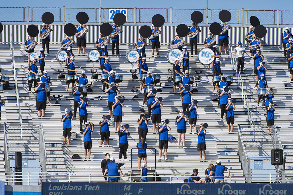 Because of COVID-19, socially distanced members of the MTSU Band of Blue wore masks as they performed during the first half of the 2020 Homecoming Game in October 2020 in Floyd Stadium. MTSU’s Blue Raiders will face Southern Mississippi at 2:30 p.m. Saturday, Oct. 30, in the Homecoming Game to conclude “A True Boo MTSU Homecoming” week. (MTSU file photo by Andy Heidt)