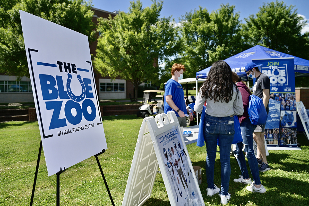 New MTSU freshmen students attending the recent CUSTOMS orientation learn about The Blue Zoo student pep organization. A variety of campus departments and student organizations participated in the Yard Party in the Student Union Commons that helped wrap up the one-day orientation for new students. (MTSU photo by Andy Heidt)