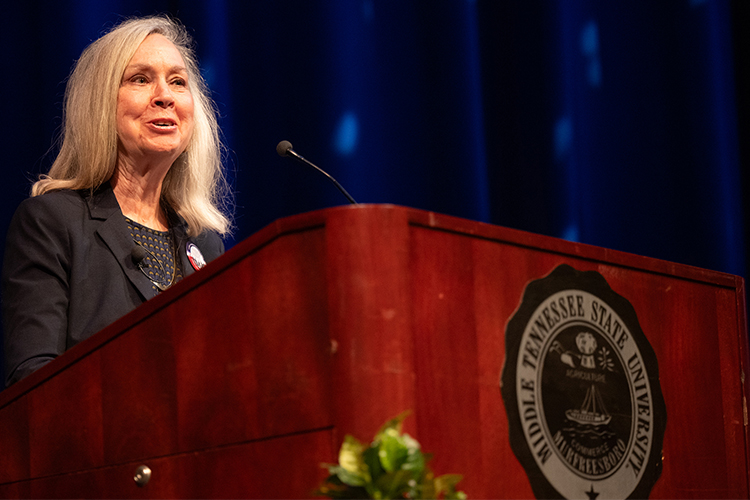 Middle Tennessee State University history professor Mary Evins, coordinator for MTSU's American Democracy Project, speaks to the audience in attendance for the annual Constitution Day keynote event held Monday, Sept. 18, 2023, in Tucker Theatre featuring former lawmakers Bob Corker and Jim Cooper. (MTSU photo by James Cessna)