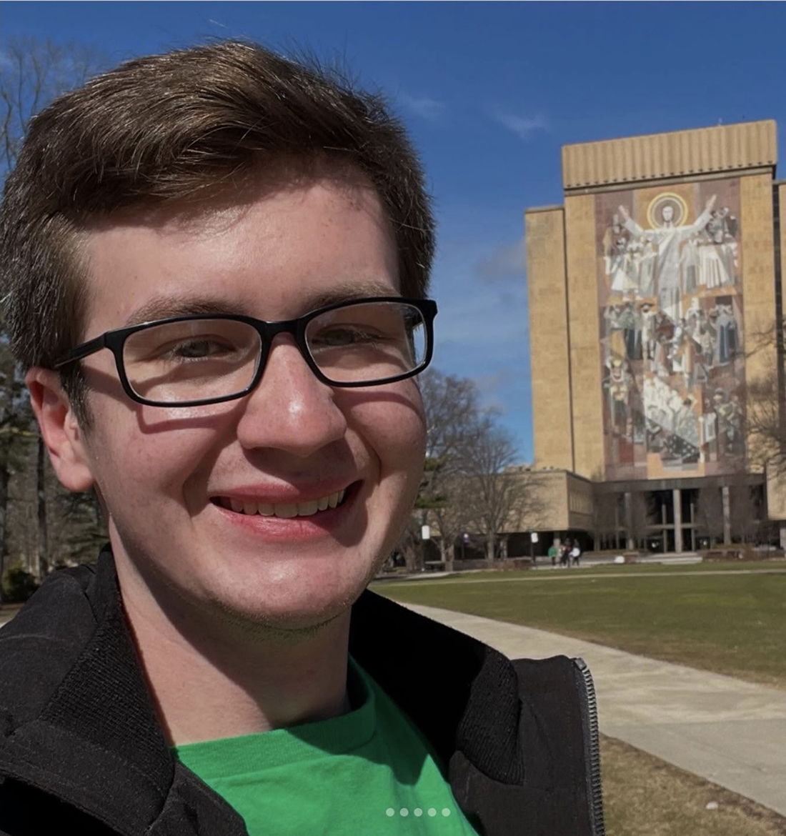 Recent Middle Tennessee State University alumnus Emerson O'Rourke stands outside the Word of Life Mural at  Hesburgh Library on the University of Notre Dame campus in South Bend, Ind. The MTSU aerospace technology graduate will be part of a five-year research group at Notre Dame.  (Submitted photo)