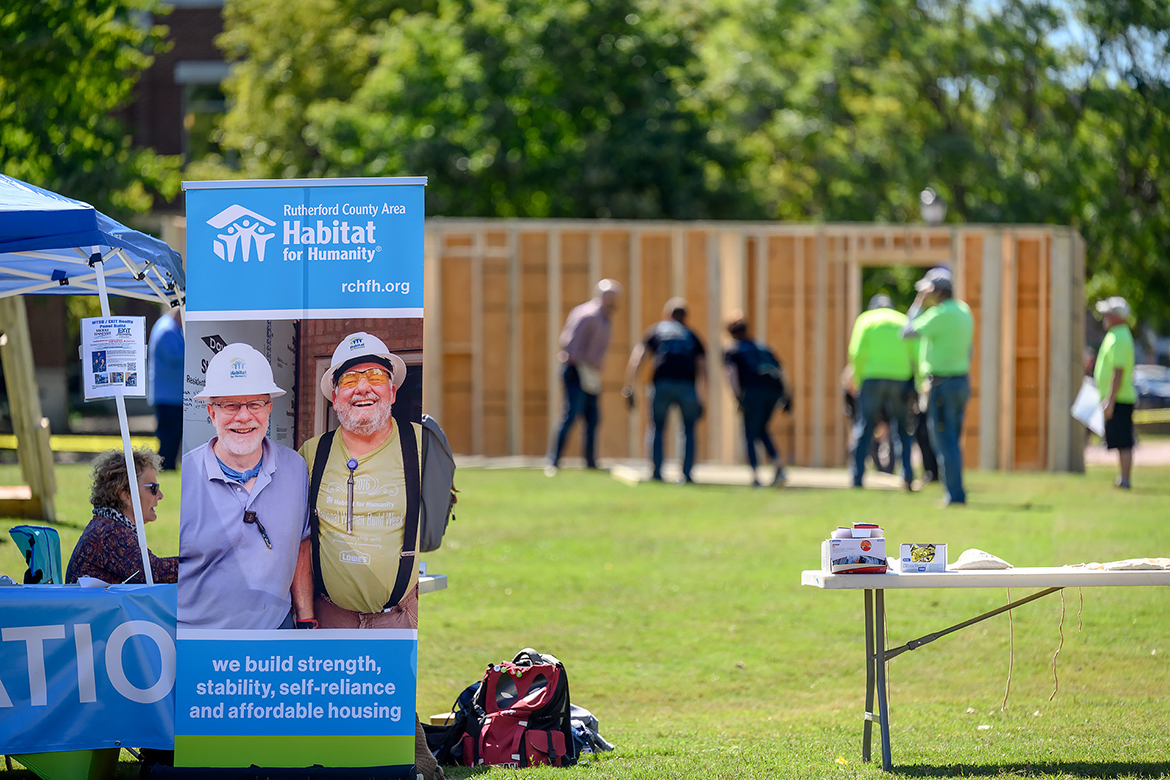 Volunteers, including MTSU students, join the construction crew Thursday, Sept. 29, for the Habitat for Humanity panel build in the Student Union Commons on campus. Dozens of people contributed manpower to the effort. MTSU Student Organizations and Service is a longtime partner with Rutherford County Area Habitat for Humanity. (MTSU photo by J. Intintoli)