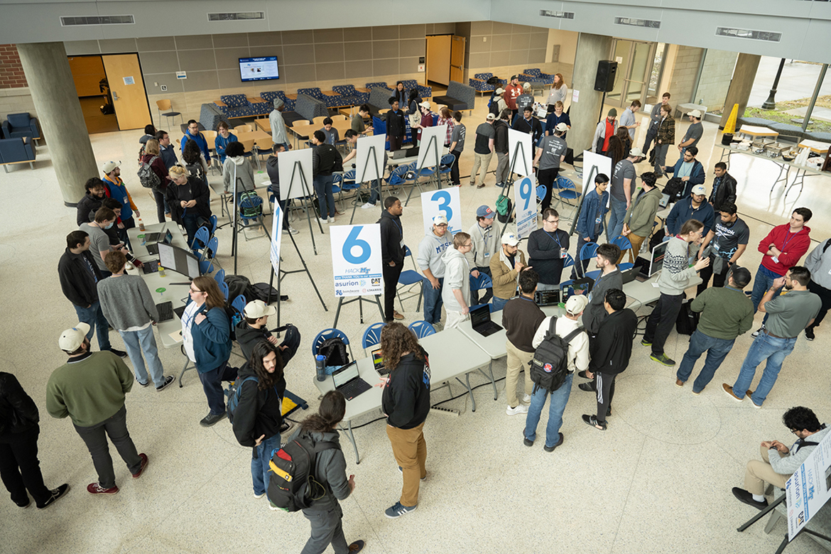 After completing their projects, dozens of computer science students wrap up the ninth annual Middle Tennessee State University Computer Science HackMT in the Liz and Creighton Rhea Atrium in the MTSU Science Building during the judging phase of the event on Sunday, Jan. 28. They spent 36 hours collaborating on their apps, games and other technology. (MTSU photo by James Cessna)
