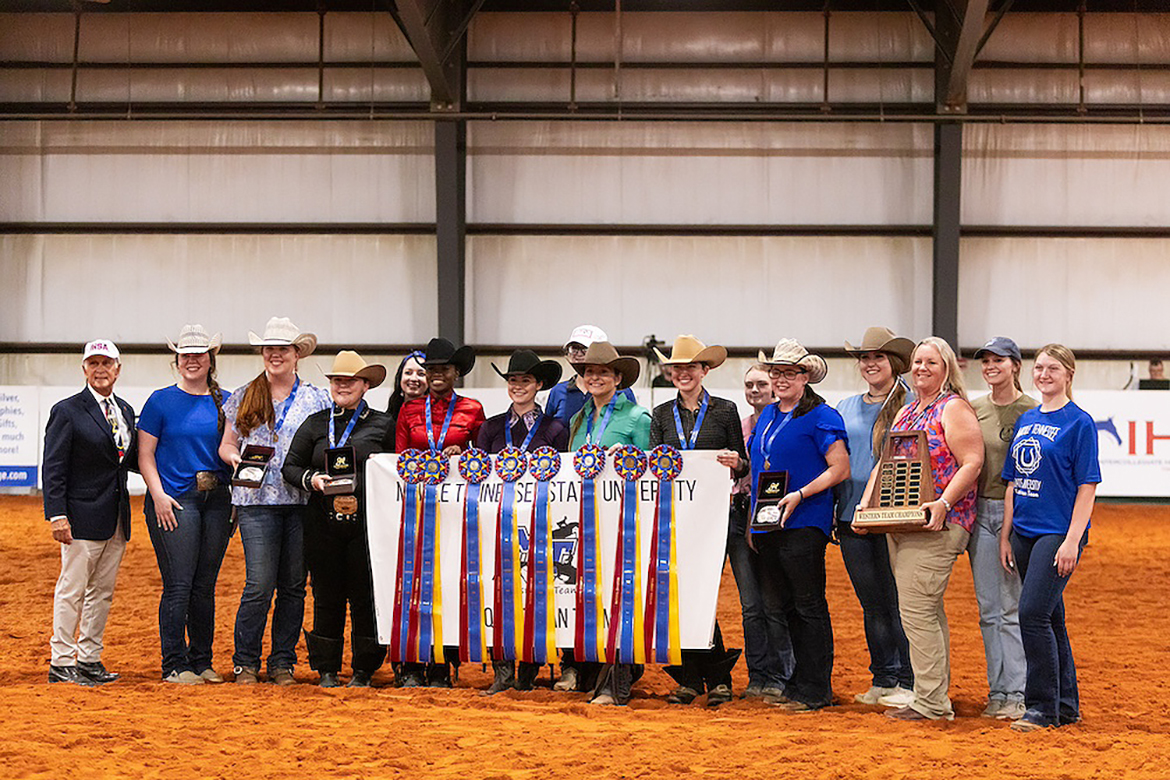 Intercollegiate Horse Show Association Founder Bob Cacchione, left, joins Middle Tennessee State University Western coaches and team members, who captured their second consecutive national championship in the competition held May 3-5 at Tryon International in Mill Spring, N.C. Along with the qualified team, the Blue Raider riders had an individual qualified in all seven Western divisions, a Western high point rider and one hunter seat rider. (Photo by Hannah Foreman)
