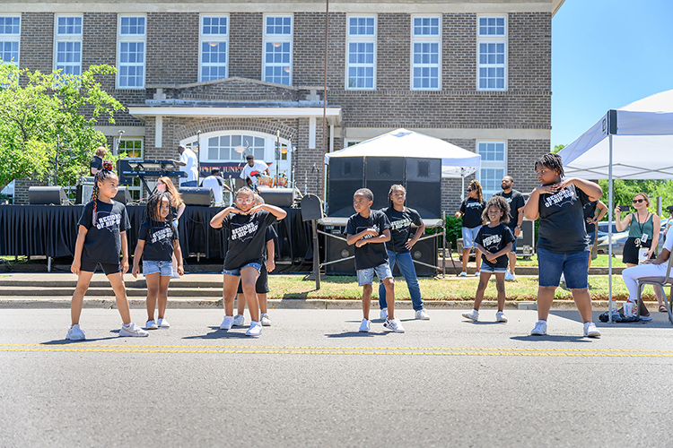 A young hip-hop dance group performs for the crowd at the 2022 Juneteenth Festival at Bradley Academy Museum and Cultural Center in Murfreesboro, Tenn. The 2023 street festival is set for Saturday, June 17, and will include a kids’ zone, food vendors, artists, arts and crafts vendors, and live music and dancing. Middle Tennessee State University will again have representatives staffing information tables. (MTSU file photo by James Cessna)