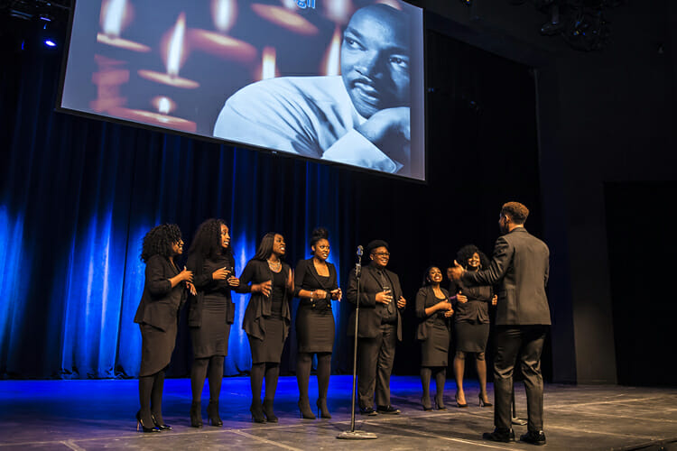 The MTSU Generation of Purpose gospel choir performs “King Jesus is A-Listening” during the Monday, Jan. 15, celebration and candlelight vigil at Tucker Theatre in honor of Dr. Martin Luther King Jr. (MTSU photo by Eric Sutton)