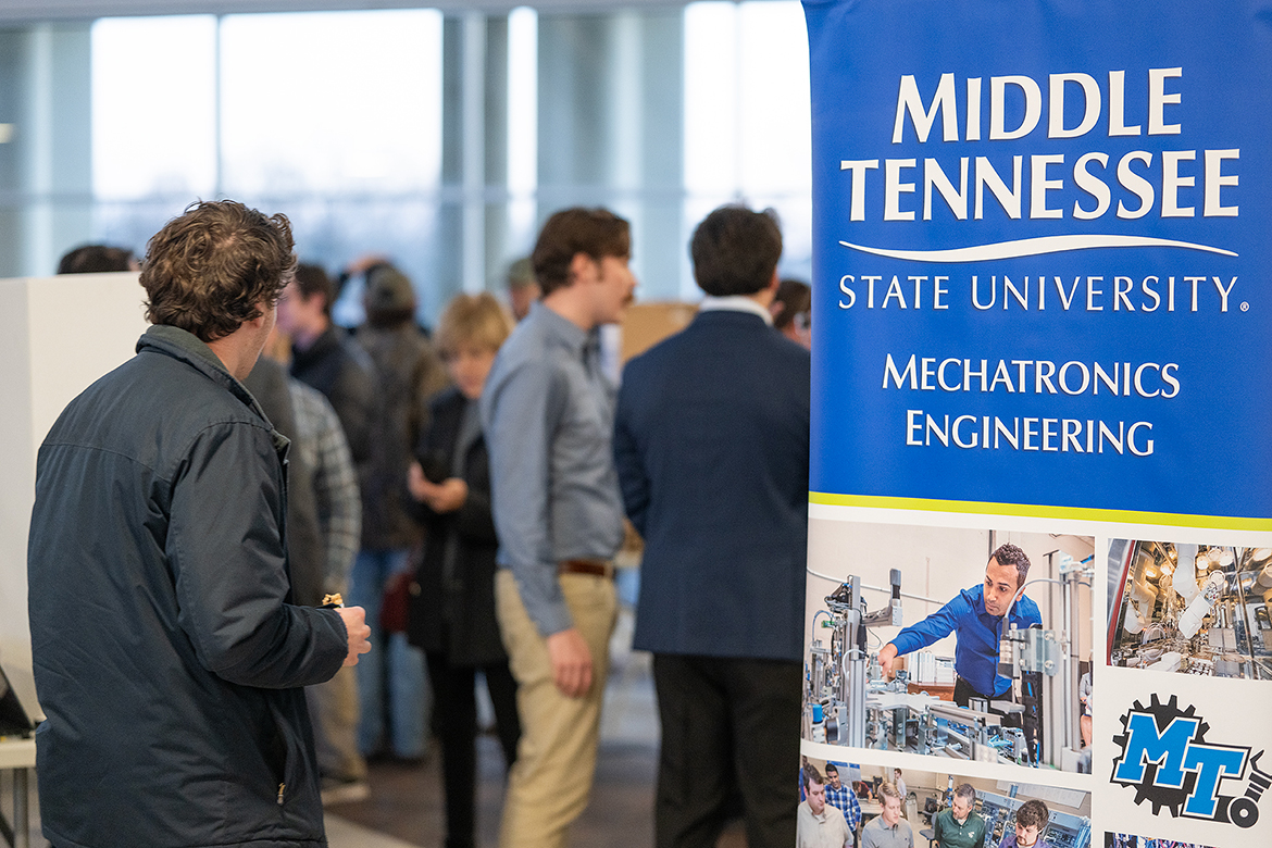 A crowd gathers for the fall 2024 Mech-Tech event showcasing Middle Tennessee State University Department of Engineering Technology’s engineering and mechatronics engineering senior students’ capstone projects held Dec. 5 in the Miller Education Center on Bell Street in Murfreesboro, Tenn. (MTSU photo by Cat Curtis Murphy)