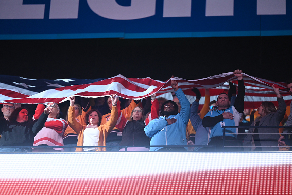 Nashville Predators’ fans hoist a large U.S. flag while the national anthem is performed during the March 2023 Preds MTSU Night/Military Appreciation game at Bridgestone Arena in Nashville, Tenn. The Predators play the San Jose Sharks at 7 p.m. Tuesday, March 19, in this year’s Preds True Blue Night/Military Appreciation event. (MTSU file photo by James Cessna)