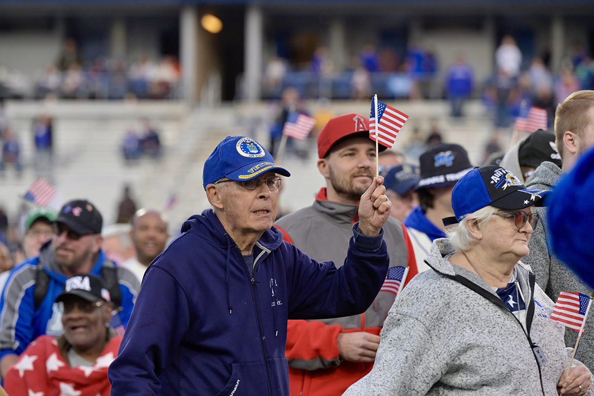 A group of veterans go across Horace Jones Field in Floyd Stadium during special halftime ceremonies Saturday, Nov. 11, at the 41st annual Middle Tennessee State University Salute to Veterans and Armed Forces game. The MTSU Band of Blue performed military theme songs as they crossed the field. (MTSU photo by Andy Heidt)