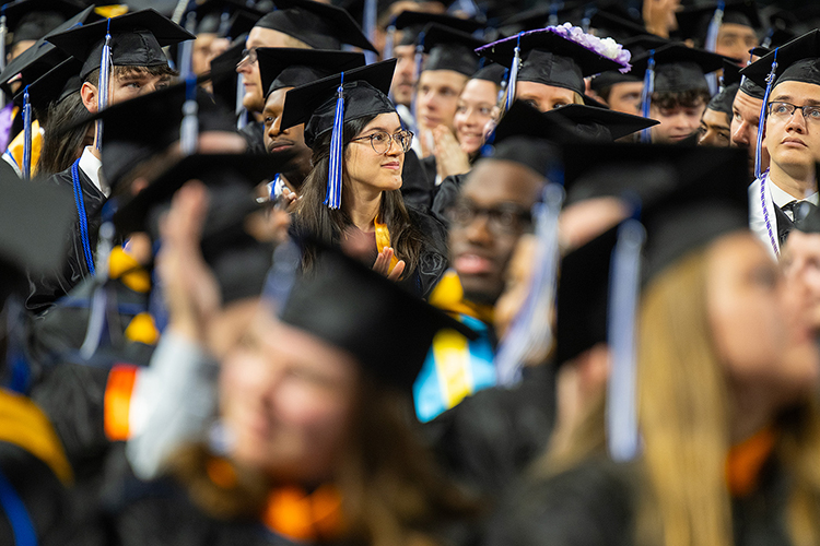 A Middle Tennessee State University graduate soaks in the occasion at the Saturday, May 10, morning spring commencement ceremony inside Murphy Center on the MTSU campus in Murfreesboro, Tenn. (MTSU photo by Cat Curtis Murphy)