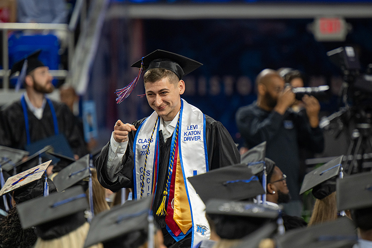 Middle Tennessee State University graduate Levi Katon Driver is all smiles after receiving his degree. (MTSU photo by Cat Curtis Murphy)