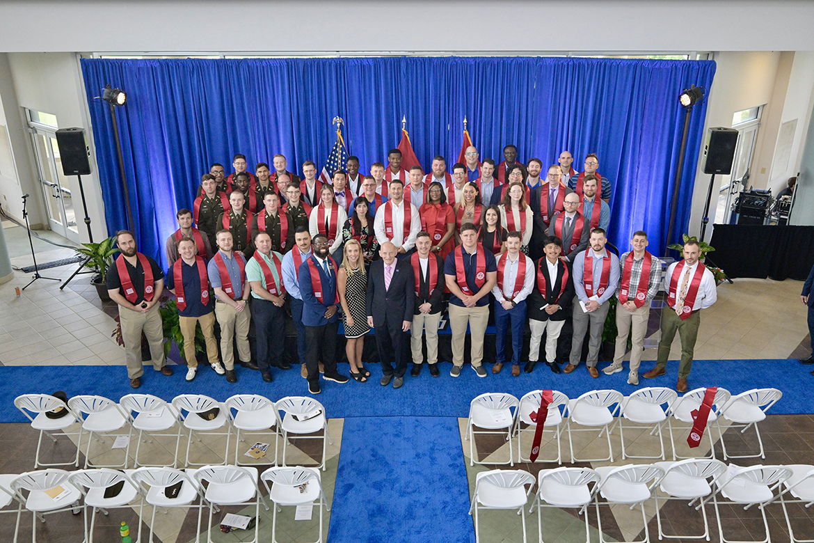 Middle Tennessee State University graduating senior veterans, including Military Science ROTC members who will be commissioned as U.S. Army second lieutenants, join Middle Tennessee State University Charlie and Hazel Daniels Veterans and Military Family Center staff attend the Graduating Senior Stole Ceremony for spring 2025 Thursday, May 8, in the Miller Education Center. Nearly 100 students will graduate in ceremonies Friday and Saturday, May 9-10, in Murphy Center. (MTSU photo by Andy Heidt)