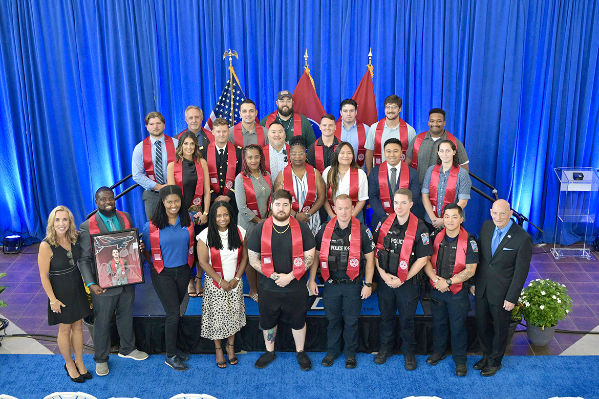 Middle Tennessee State University graduating senior veterans and faculty members including University Police Department officers are shown following the summer Graduating Veterans Stole Ceremony, held Friday, Aug. 9, at the Miller Education Center on Bell Street in Murfreesboro, Tenn. More than 30 veterans graduated Saturday, Aug. 10, in ceremonies at Murphy Center. (MTSU photo by Andy Heidt)