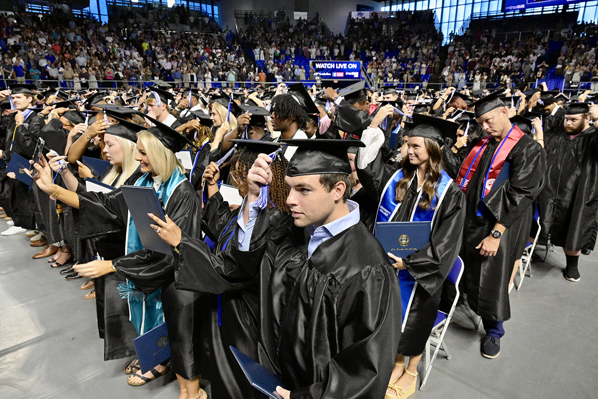 More than 720 Middle Tennessee State University graduates move their tassels from right to left as acknowledgment of earning their degrees during the summer 2025 commencement ceremony held Saturday, Aug. 9, inside Murphy Center on campus in Murfreesboro, Tenn. (MTSU photo by Andy Heidt)