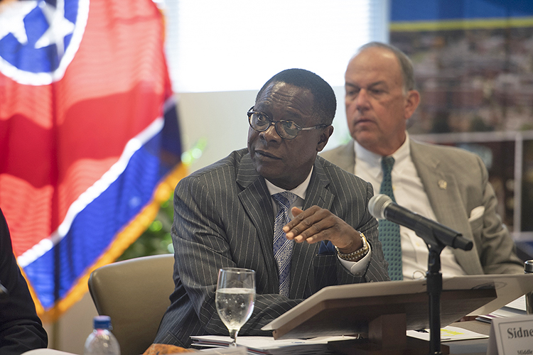 MTSU President Sidney A. McPhee listens to a staff presentation at the quarterly Board of Trustees meeting held Wednesday, Sept. 18, in the Miller Education Center. At right is Board Chairman Stephen B. Smith, who was reelected to a two-year term at the meeting. (MTSU photo by James Cessna)