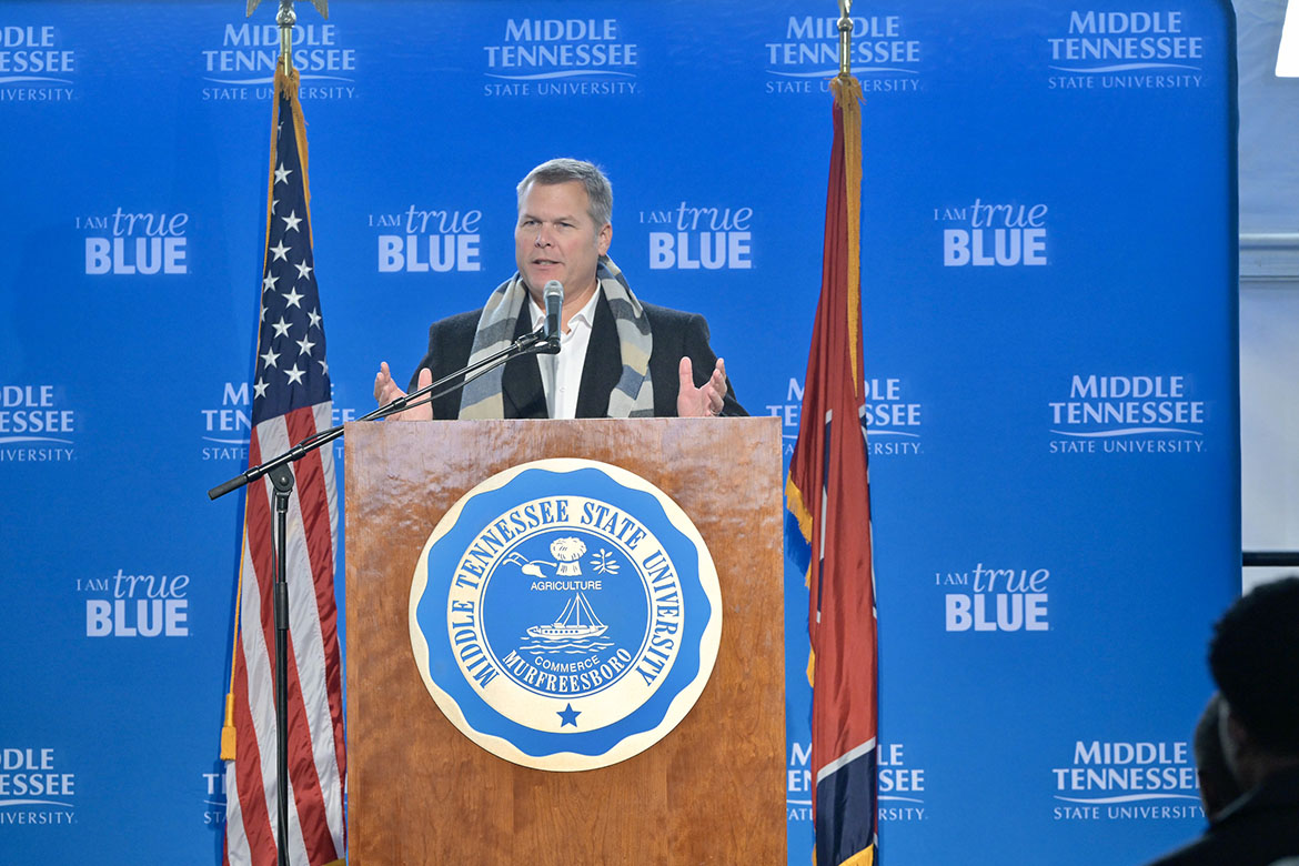 Shelbyville Municipal Airport manager Paul Perry addresses a crowd of over 100 who braved near freezing weather on Wednesday, Dec. 3, during the groundbreaking ceremony for the new $73.4 million, state-of-the-art Middle Tennessee State University Aerospace facility that will be located at the Shelbyville, Tenn., facility. (MTSU photo by Andy Heidt)