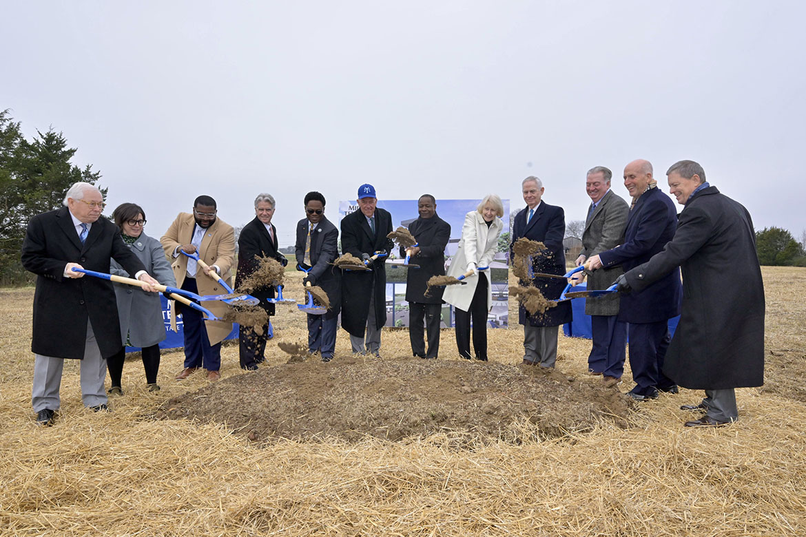 Performing the ceremonial shoveling of dirt during the groundbreaking ceremony held Wednesday, Dec. 3, for the new $73.4 million Middle Tennessee State University Aerospace facility that will be built at the Shelbyville Municipal Airport in Shelbyville, Tenn., are MTSU representatives, from left, J.B. Baker, MTSU Board of Trustees member; Kari Neely, MTSU faculty trustee; Michai Mosby, MTSU student trustee; Bill Jones and Michael J. Wade, trustees; Steve Smith, Board of Trustees chair; MTSU President Sidney A. McPhee; Christine Karbowiak Vanek, Board of Trustees vice chair; and Tom Boyd, John Floyd, Jimmy Granbery and Pete Delay, trustees. (MTSU photo by Andy Heidt)