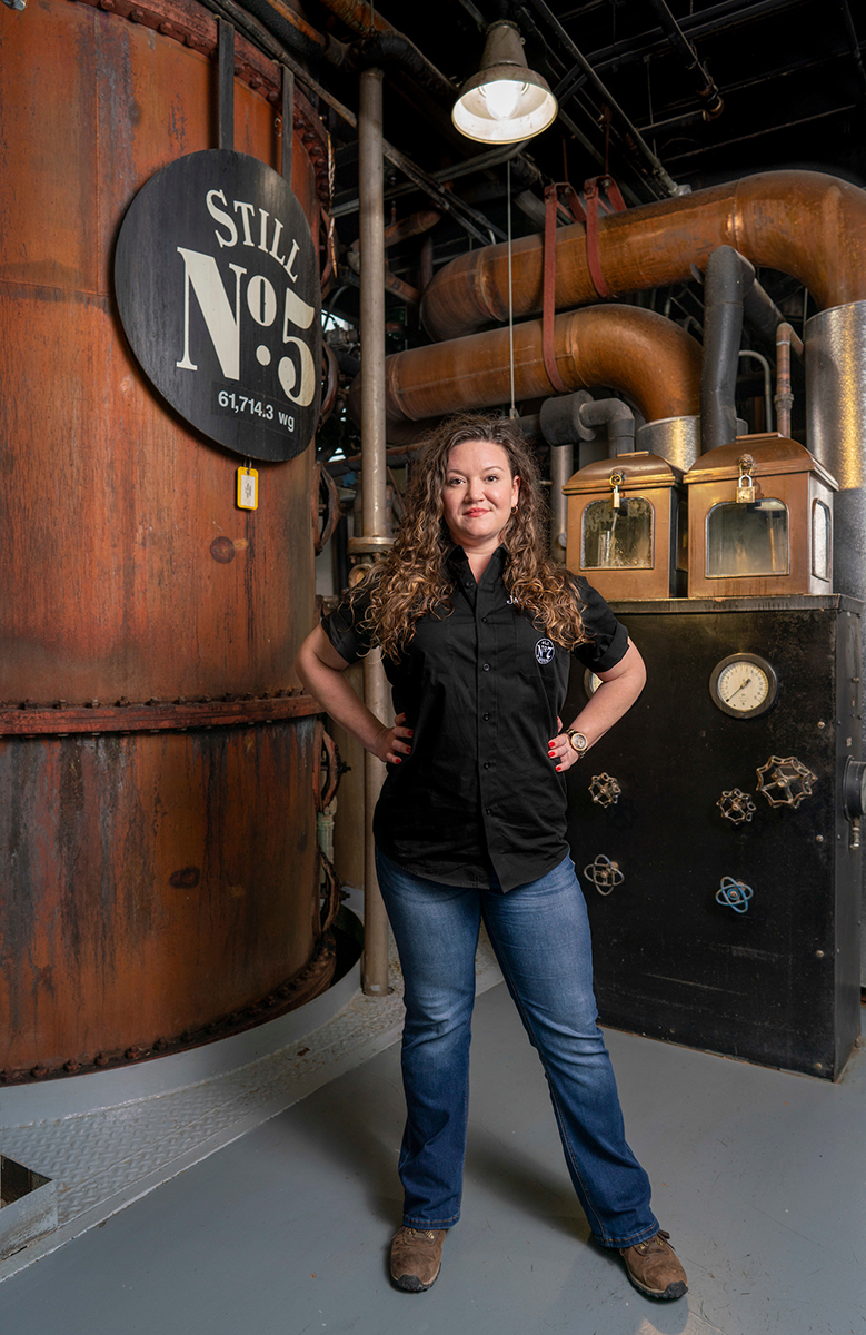 Shown in the Jack Daniel Distillery Stillhouse, MTSU alumna Lexie Phillips of Estill Springs, Tenn., was promoted to assistant distiller — the first time a female has been elevated to that position with the company. She credits professor and MTSU Fermentation Science Director Tony Johnston with providing knowledge that piqued her interest in that field. (Submitted by Jack Daniel Distillery)