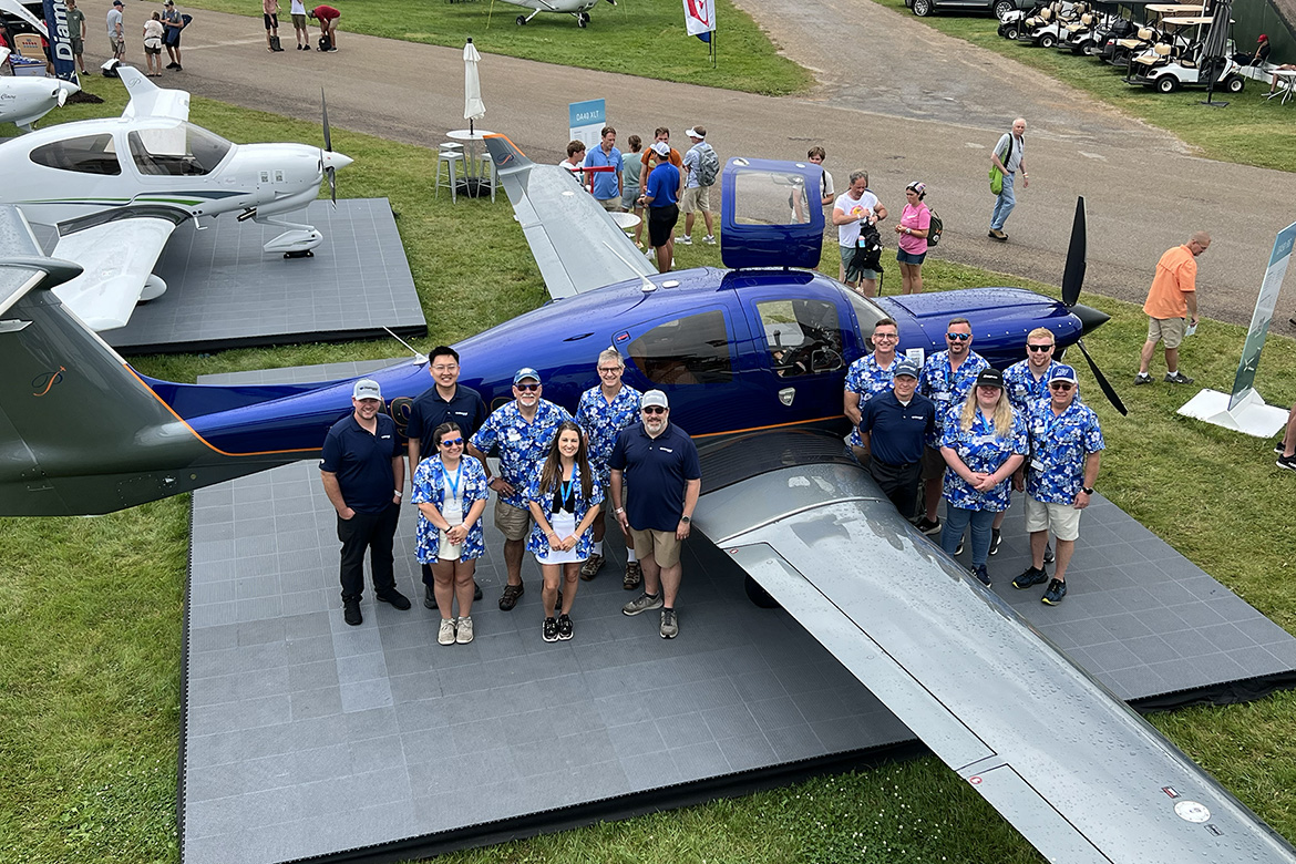Part of the delegation representing the Aerospace Department of Middle Tennessee State University in Murfreesboro, Tenn., visit the pilot shop of Piper Aircraft during the university’s attendance at the 72nd EAA AirVenture aviation showcase held July 21-27 in Oshkosh, Wis., known as “the world’s largest gathering of aviation enthusiasts.” (MTSU photo by Andrew Oppmann)