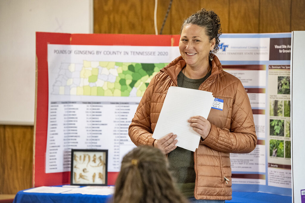Caitlin Elam with the Tennessee Department of Environment and Conservation/Division of Natural Areas, discusses ginseng regulations and harvest in Tennessee. She spoke during the annual Tennessee Ginseng Growers in November 2021 at Barfield Crescent Park’s Wilderness Station in Murfreesboro, Tenn. The MTSU International Ginseng Institute Workshop and Demo Day will be held from 10 a.m. to 1 p.m. Friday, Oct. 21, at the same location. (MTSU file photo by Andy Heidt)