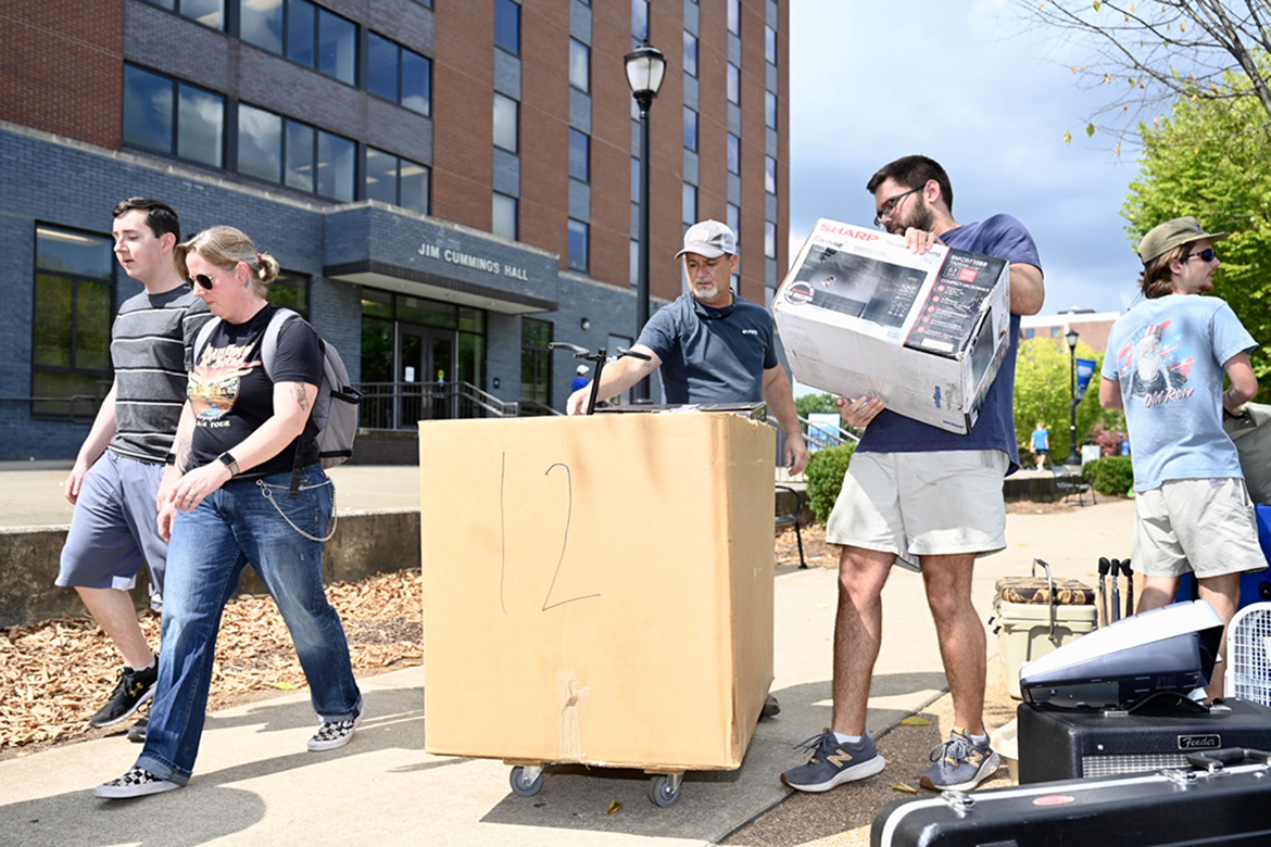 In this Fall 2022 photo, a family loads items into a bin for a new Middle Tennessee State University student who will be living in Jim Cummings Hall on the MTSU campus. University officials say residence halls are already at capacity for the Fall 2023 semester. (MTSU photo by J. Intintoli)