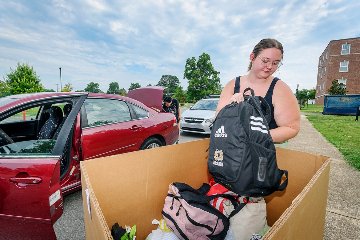 Middle Tennessee State University sophomore theatre major Brandi Lokey, of Crossville, Tenn., loads a backpack on top of other items headed for her residence hall on campus in Murfreesboro, Tenn., on Wednesday, Aug. 20, the first of three move in days for nearly 2,700 students living in campus housing this fall. MTSU classes begin Monday, Aug. 25. (MTSU photo by Andy Heidt)