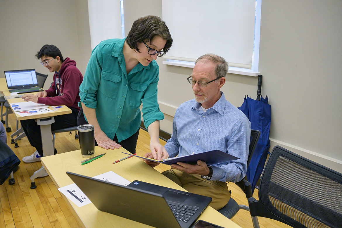 Middle Tennessee State University Physics and Astronomy Department associate professor Hanna Terletska, left, and chair Ron Henderson confer during her Introduction to Quantum Computing class for 17 STEM (science, technology, engineering and mathematics) students. The MTSU Quantum Science Initiative have been launched. Henderson and physics instructor Neda Naseri are training in the course. (MTSU photo by Andy Heidt)