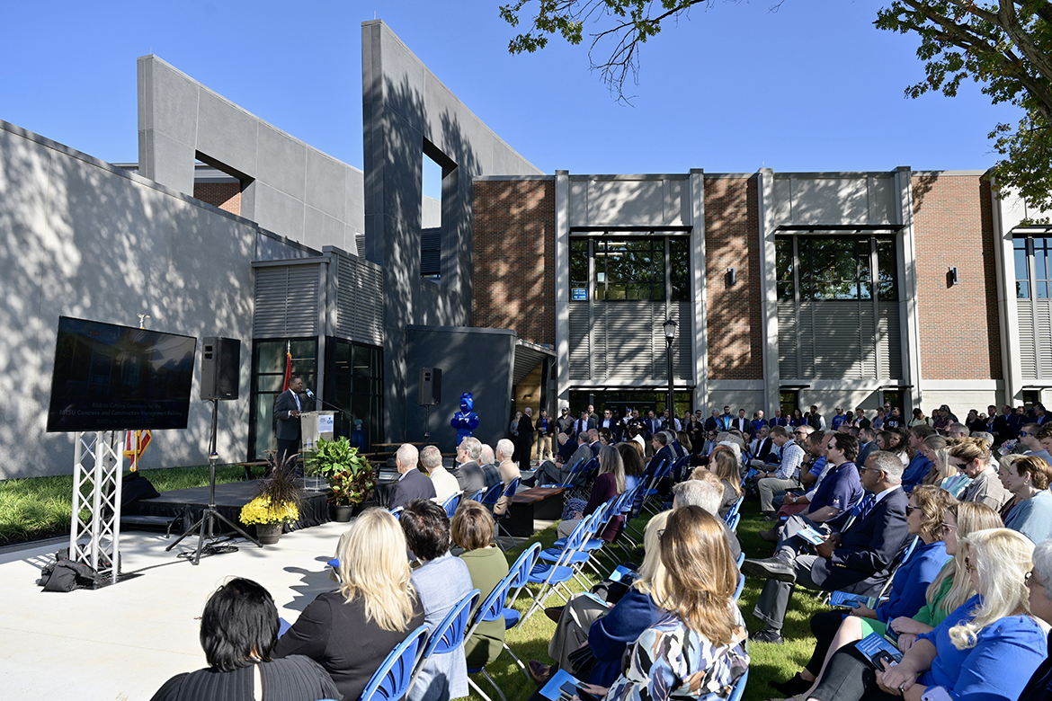 With a large crowd gathered on the lawn outside the just-opened MTSU Concrete and Construction Management Building, they listen as university President Sidney A. McPhee acknowledges all the support that went into the $40.1 million facility Thursday, Oct. 13. MTSU unveiled the 54,000-square-foot building with a ribbon cutting, speeches and tours. (MTSU photo by Andy Heidt)