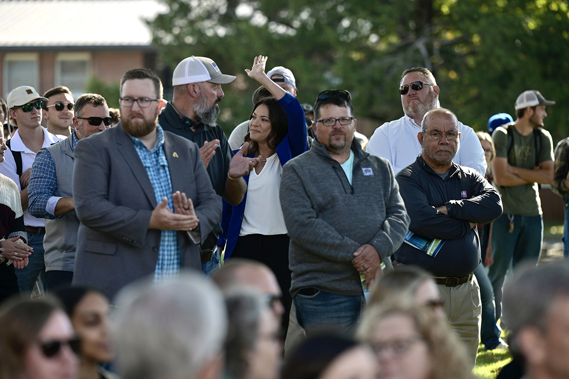 Former MTSU School of Concrete and Construction Management Director Heather Brown, center, waves to the crowd attending the ribbon-cutting ceremony for the new building on campus Thursday, Oct. 13. Brown led the program before leaving to take a position with Irving Materials Inc. (MTSU photo by Andy Heidt)