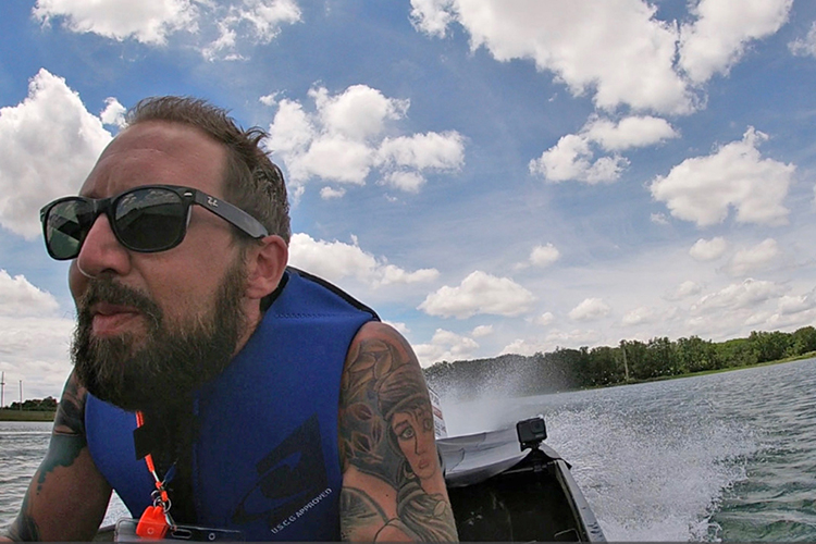 MTSU solar boat team captain Hunter Hudson pilots the vehicle during a portion of the recent Solar Splash competition held on Champions Park Lake adjacent to the Clark County Fairgrounds in Springfield, Ohio. MTSU placed fourth overall and won awards for Outstanding Workmanship, Outstanding Hull Design and Drive Train Design to go with third-place in the 300-meter sprint. (Submitted photo)