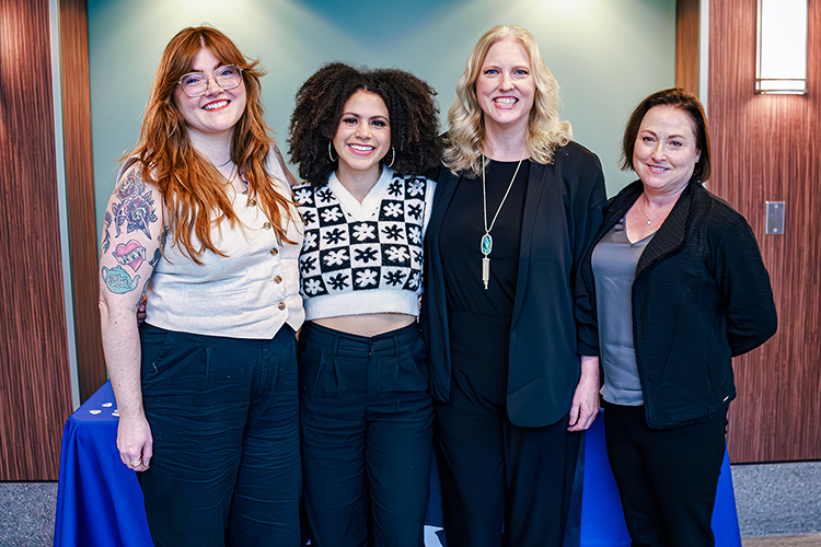 From left, Maggie Arthur, director of Calling All Crows, country music artist Julie Williams, MTSU College of Media and Entertainment Dean Beverly Keel, and The Change Agent·cy’s Chief Communications Officer Lisa Chader pose for a photo at the launch of Williams’ collaborative multicity college tour titled “Green Room Conversations” March 27 in the College of Education Building at Middle Tennessee State University in Murfreesboro, Tenn. The tour’s purpose is to raise awareness about sexual harassment in the music industry as part of Sexual Assault Awareness Month in April. (Photo courtesy of The Change Agent·cy)