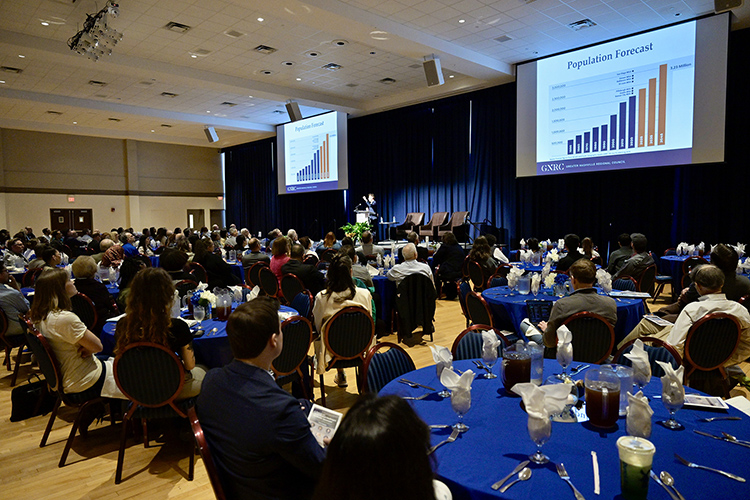 The crowd looks on as Michael Skipper, executive director of the Greater Nashville Regional Council, reviews the population growth in the region at “A Forum on Growth and Challenges in Middle Tennessee” held March 15 in the James Union Building’s Tennessee Room at Middle Tennessee State University in Murfreesboro, Tenn. (MTSU photo by Andy Heidt)