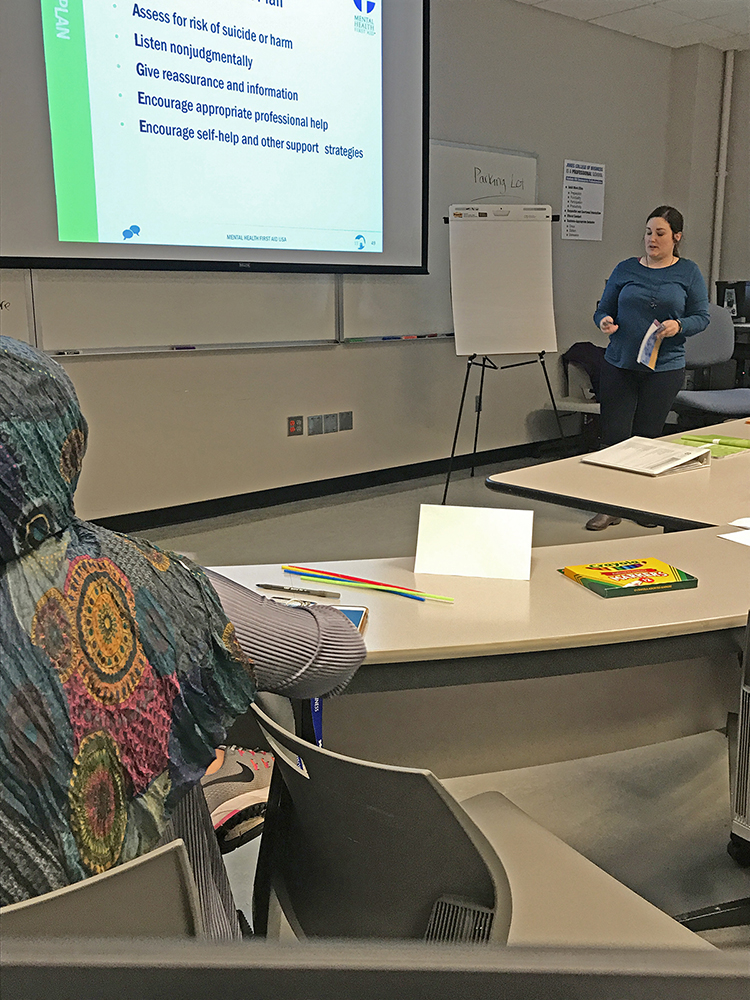 Angela Mueller, Mental Health First Aid project assistant for the MTSU Center for Health and Human Services and a graduate student in the professional counseling program, conducts a certification training workshop earlier this spring on campus. (Submitted photo)