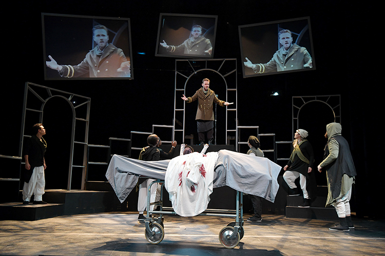 Sam Ashdown, center, calls on friends, Romans and countrymen to hear his eulogy for the assassinated Roman dictator as he portrays Marc Antony in the Nashville Shakespeare Festival's winter 2019 production of "Julius Caesar." The tragedy is being presented Thursday-Saturday, Jan. 31-Feb. 2, at MTSU's Tucker Theatre in the Boutwell Dramatic Arts Auditorium; ticket information is available at http://nashvilleshakes.org. (Nashville Shakespeare Festival photo by Rick Malkin)