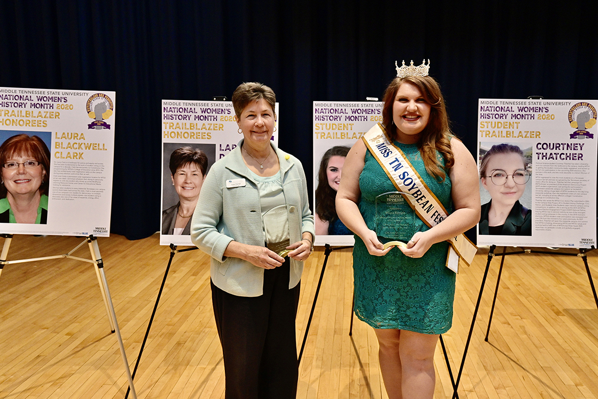 Four members of the campus community were chosen by the MTSU National Women’s History Month Committee for “trailblazer” awards. From left, Lara Daniel, a professor in the Jones College of Business, and Miura Rempis, a junior political science major, show their awards at the March 3 opening ceremony. Not pictured are Laura Blackwell Clark and Courtney Thatcher. (MTSU photo by Andy Heidt)