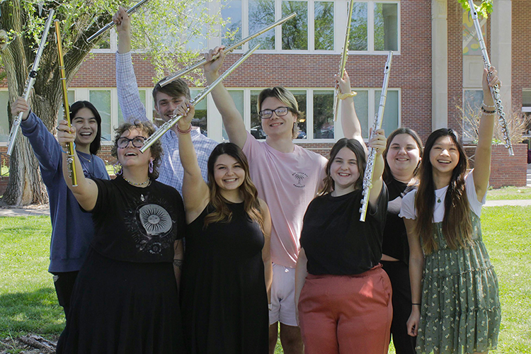 Eight Middle Tennessee State University students were selected to and attended the prestigious National Flute Association Convention this August, a record number of students for Deanna Little, MTSU flute professor. Pictured, back row, from left, are convention attendees and students Italee Philom, Jonathan Oldham, Jakob Young and Sarah Potts; front row, from left, are Olivia Guthier, Alyssa Jones, Katie Beatty and Chelsea Liu in front of Saunders Fine Arts Building on campus. (Submitted photo)